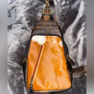 - Cowhide Myra bag crossbody